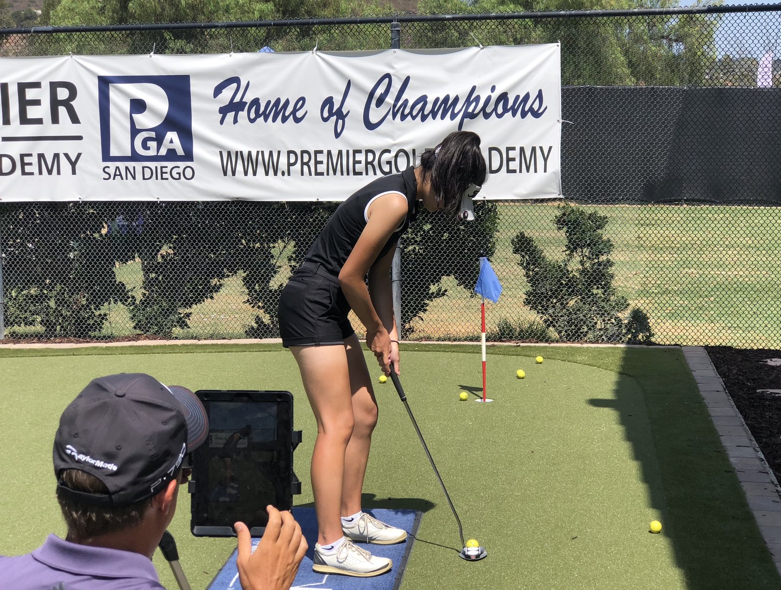 Putting lesson with video on the practice green