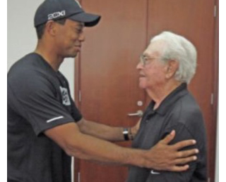 John Anselmo with Tiger Woods